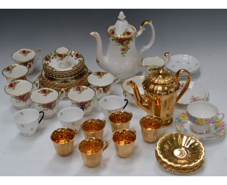 A Royal Albert Old Country Roses pattern tea set, for six, comprising cups, saucers, side plates, teapot, milk jug and sugar 