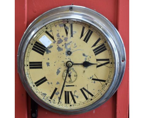 An early/mid 20th century chrome plated circular wall clock, Roman numerals, subsidiary dial