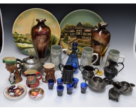 Ceramics and Glass - an Art Deco blue glass six-setting liquor decanter set; architectural composition circular plaques, c.19