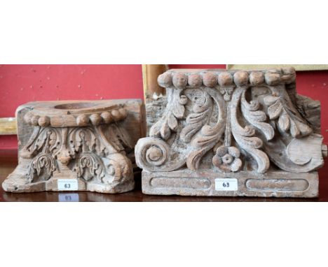 An Indian hardwood architectural fragment, carved as a Corinthian capital, 27cm wide, 19th century; another, similar (2)