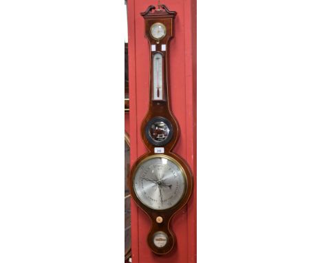 An early 20th century mahogany banjo barometer, swan neck pediment centred by an urnular finial, outlined throughout with box