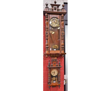 A 20th century Vienna type wall clock, 18cm dial with bold Roman numerals, approx 121cm high overall; another, similar, small