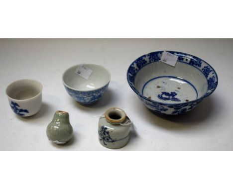 A Chinese blue and white pedestal bowl; another similar, smaller; an ink pot; a wine cup; a miniature celadon vase, 4cm high 