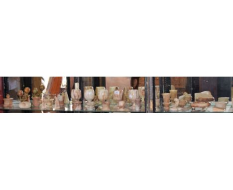 Chellaston alabaster, various pieces including miniature vases, desk weights, lidded trinket pots, etc; a set of six onyx gob