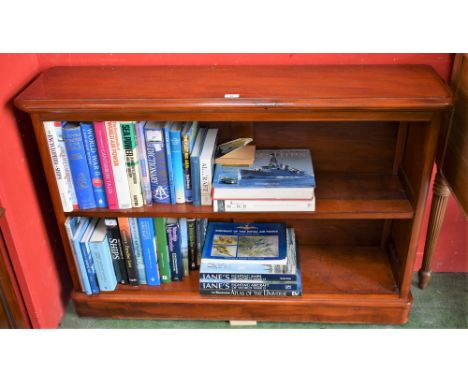 A Victorian style mahogany low bookcase, rounded rectangular top above a shelf, rounded plinth base, 122.5cm wide