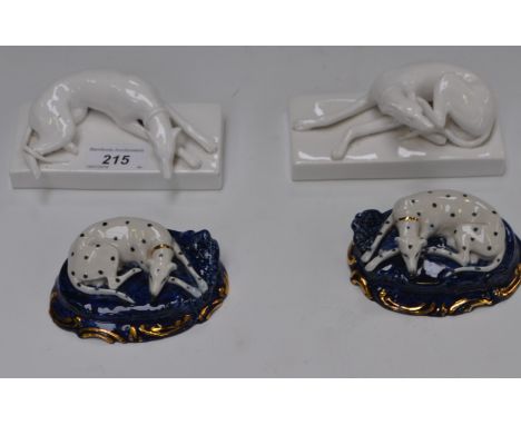 A pair of ceramic Dalmatians; another pair, blanc de chine (4) Condition Report: The blanc de chine dog, 10cm x 8xm x 3.5cm h