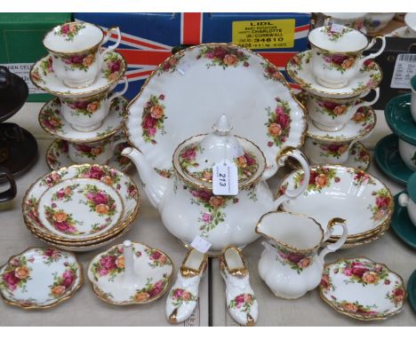 A Royal Albert Old Country Roses pattern part tea set including tea pot, cups, saucers, milk jug, bread and butter plate and 