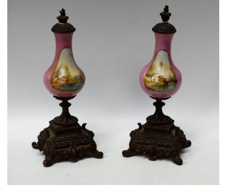 A pair of 19th century French gilt metal mounted mantel vases, each painted with river scene on pink ground (2)