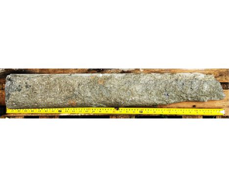 Detached shafts of Derbyshire Spar. 
Examples of this fossil-rich grey stone, chosen by Pearson as an alternative to the Purb