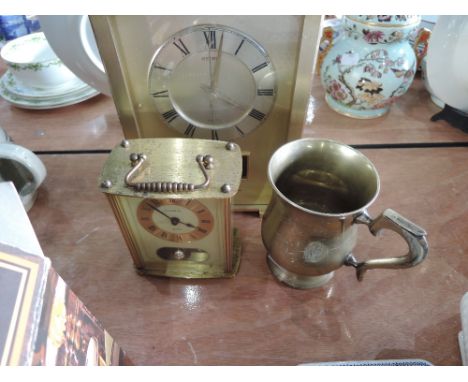 Two modern brass effect mantel clocks and tankard