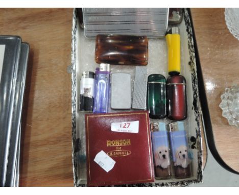 A selection of vintage lighters including Ronson and engine tooled cigarette cases