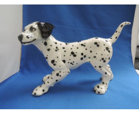 A Goebel fireside study, Dalmatian puppy at play