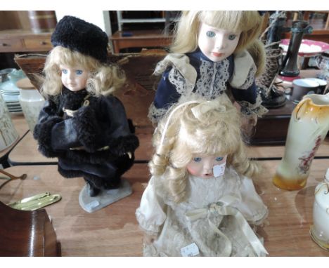 Three ceramic collectors dolls 