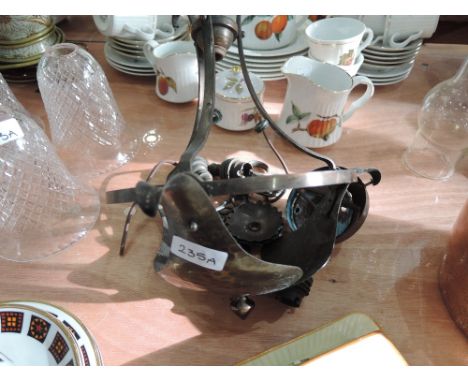 An arts and crafts style planished copper light fitting