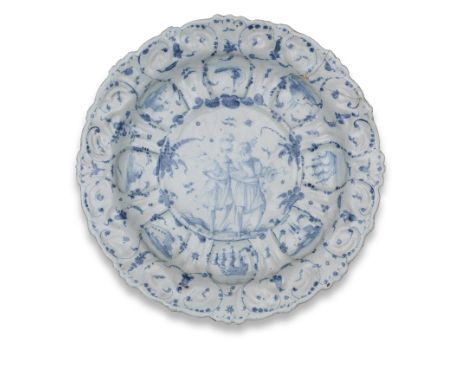 A Savona maiolica large circular dish, second half 17th centuryMoulded with scrollwork motifs issuing from the rim of the wel