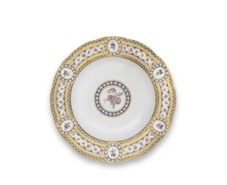 A Sèvres soup plate (assiette à potage) from the 'Service de la Reine' ordered by Marie-Antoinette, dated 1784Painted by Char