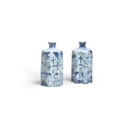 A pair of lobed Savona maiolica bottles, second half 17th centuryEach decorated in shades of blue with putti in landscapes, t