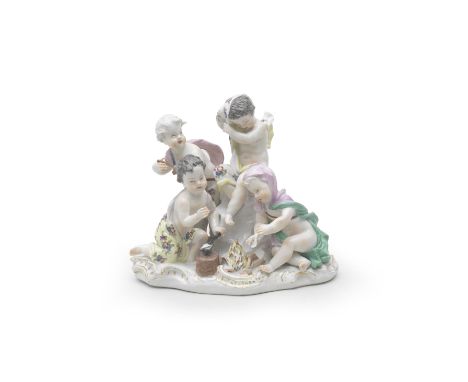 A Meissen group of putti emblematic of Winter, mid 18th centuryModelled with four putti, one kneeling working on an arrowhead