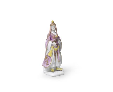 A Meissen figure of a Turkish lady, last quarter 18th centuryHolding a fan, wearing a pink and gilt headdress, pink robes wit
