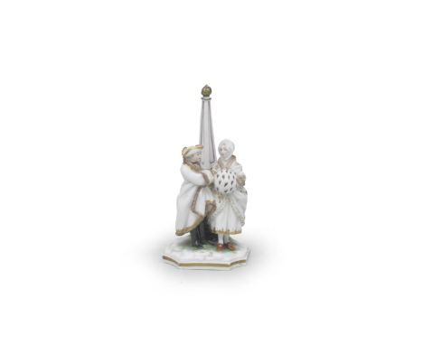 A German porcelain miniature group of a lady and gentleman, circa 1755-60Each wearing fur-lined cloak, the gentleman in a whi