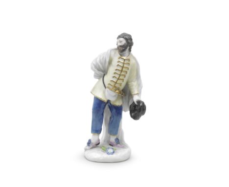 A Meissen figure of Scapin from the Duke of Weissenfels seriesModelled by P. Reinicke and probably J.J. Kaendler, wearing a w