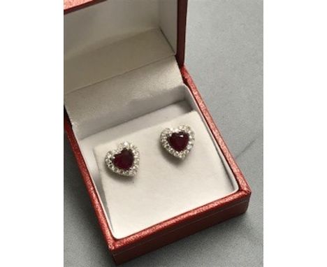 Pair of 18 carat white gold heart shaped ruby and diamond earrings