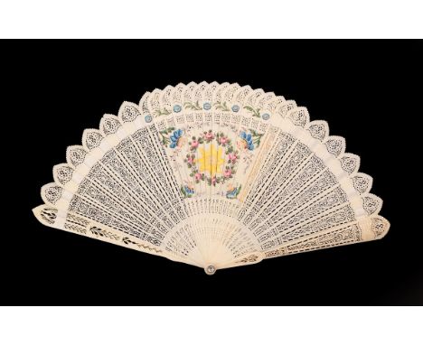 A Scarce 19th Century French Four-Way Bone Brisé Fan with classically pierced sticks, the first engraved and hand-coloured sc