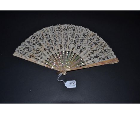 Ghent Valenciennes, A Very Fine Handmade Bobbin Lace Leaf, circa 1900, mounted on plain pink mother-of-pearl sticks and conti