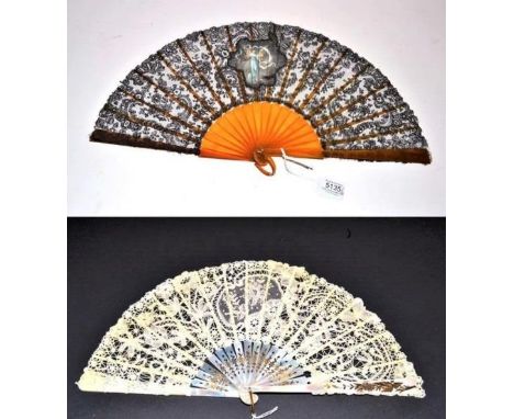 An Attractive Floral Black Lace Fan, most likely Chantilly, circa 1900, the leaf incorporating a central painted gauze panel 