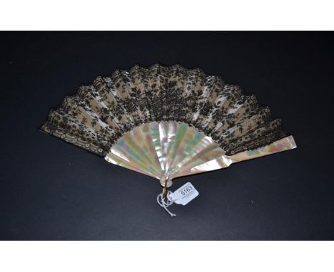 Circa 1860's A Black Chantilly Lace Fan backed with cream silk, and mounted on green/pink mother-of-pearl (burgau). Diamante 