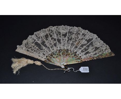A Very Attractive Circa 1900 Brussels Needle Lace Fan, the Art Nouveau designed leaf mounted onto slightly pink mother-of-pea