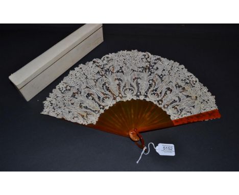 A Fine Belgian Mixed Lace Fan of Art Nouveau Design, circa 1900, the crisp and clean leaf mounted on plain resin or ''blonde 