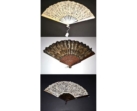 A Late 19th Century Brussels Bobbin Lace Fan, the leaf mounted on white mother-of-pearl, the design of flowers and leaves. To