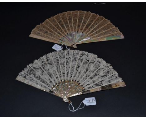 An Early 20th Century Mother-of-Pearl Fan with an embroidered net leaf, most likely Limerick lace, the pearl the green/pink o
