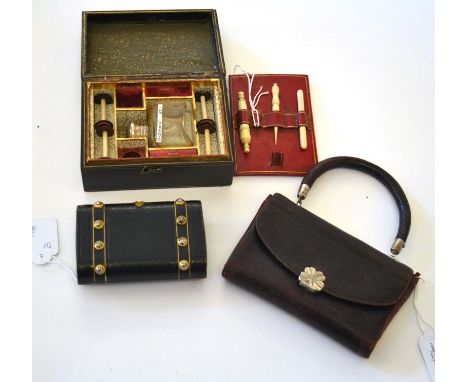 Three 19th Century Leather Covered Sewing Sets, the first of handbag form with rigid handle, the interior unfolding to reveal