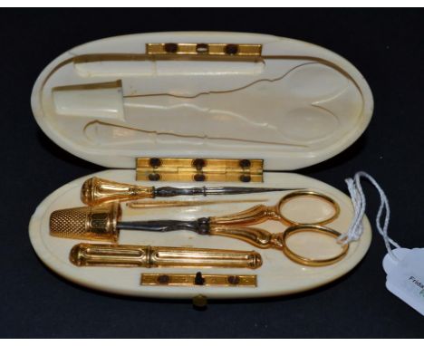 A Gilt Metal Sewing Set, French marks with maker's mark 'AOB'  late 19th century, presented in an elegant oval ivory case, un