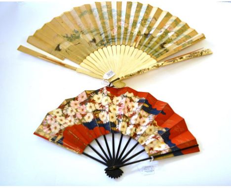 A Late 19th Century Japanese Fan, Ogi, the monture of ivory, painted with various colours of lacquer, and inset with shibayam