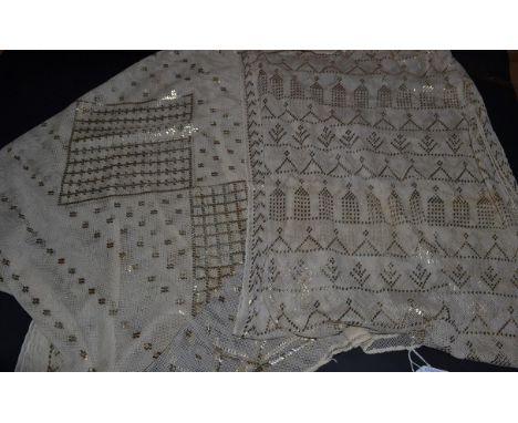 Two Cream Art Deco Azute or Assyut Shawls, from circa 1925: the first designed with three central diamonds of equal size, fil