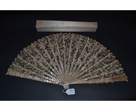 Initialled ''SH'', A Late 19th Century Brussels Bobbin Lace Fan embroidered with silver sequins, mounted on light pink mother