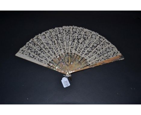 A Large Circa 1900 Pink Mother-of-Pearl Fan, the monture lightly carved and slightly pierced, gilded and silvered. The bobbin