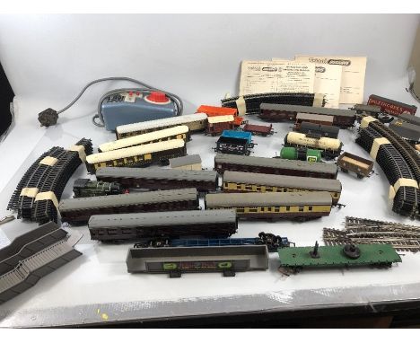 Collection of 'OO'/ 'HO' track, loco and carriages to include light up Pullman carriages, Tri-Ang Power unit RP14