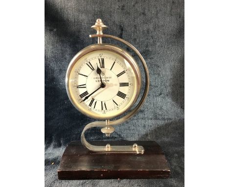Modern Quartz clock in Chrome with white face marked 49, Regent Street London