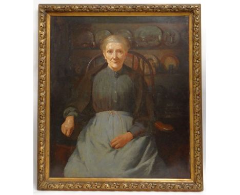 CAREY MORRIS oil on canvas - three quarter portrait of an elderly lady seated on Windsor elbow chair in front of a Welsh dres