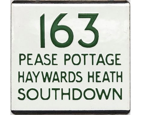 London Transport bus stop enamel E-PLATE for Southdown service 163 destinated Pease Pottage, Haywards Heath. Features the gre
