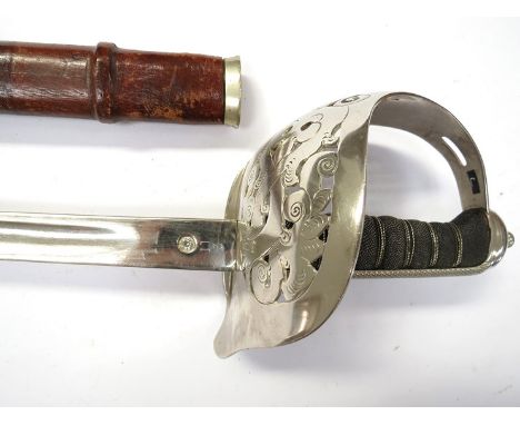 An 1897 Pattern NCO Sergeant's sword with plain blade with owners name on the hilt Major W.H. LEDGER DCM MM KOYLI in its scab