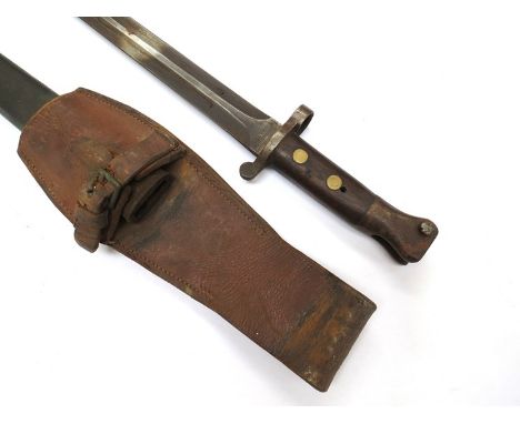 A British 1888 pattern bayonet dated 10 '90, Wilkinson London, with scabbard and brown leather frog 