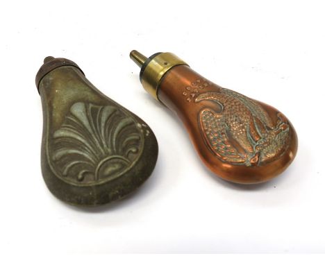 A copper and brass pistol powder flask "Colts Patent" with embossed eagle gripping a firearm, together with a shell design ex