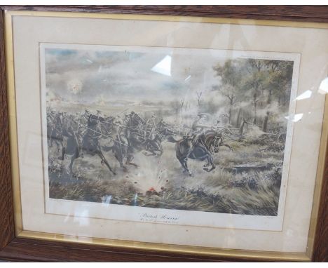 An early 20th Century print "British Heroism" depicting 9th Lancers charging guns, framed and glazed 