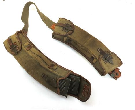 A pair of Third Reich era German MG13 ammunition pouches and neckstrap with magazines including 1938 Waffen stamped