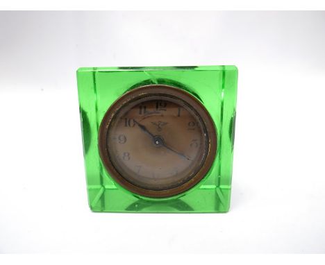 A 1930's German desk clock by Friedrich Mautne, Schwenningen, brass dial with Nazi form eagle, Arabic numerated, Deutsches Er